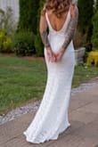 Say yes to this dress! I am so glad that I purchase this dress! It was the perfect second dress for my wedding day! I love the sleeveless low cut back, a pair beautifully with the high neck line in the front! Just the perfect amount of sassy and classy for your wedding day! I also love that it had a small train which added some elegance! - Kaleigh T.
