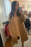 Loveee this coat. Perfect for fall and looks really classy. It fits really well but is just a little tighter on the arms so you wouldn't be able to wear a bulkier sweater with it. I bought a medium! - Jessica G.