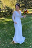 I fell in love with this dress at the first time I saw it. The shipping was quick. The dress is gorgeous and of great quality. I used it at my small wedding and everyone loved it. I'd highly recommended it. - Biara S.