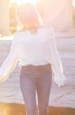 I bought this sweater to wear for engagement photos and I'm really glad I bought a back up sweater! This sweater is super cute and I wanted to love it but it's SO short! It's not short in a way that ordering a size up would fix; it would look baggy if I were to order a size up. Not at all like what's pictured. Very disappointed; unless you're looking for a crop top, I wouldn't recommend.

Edit: I wore the sweater for pictures and tucked it in; not usually my style but it didn't look terrible. After awhile it seemed almost stretched out so it wasn't super short. Still not sure how I feel about it though. Cute enough, but I'm not sure I would buy again. - Kelsey E.