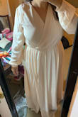 I have been looking for a formal dress for a black-tie optional wedding in November with the caveat that I will be 6 months pregnant. Maternity dresses seem to be a bit pricier and unnecessary since my bump isn't too big yet. I am SO glad I tried this dress and absolutely can't wait to show it off at this wedding! The sleeves and the shoulders are a smidge loose but not so big it overwhelms me. The elastic waist is perfect for sitting at your natural waist or in my case, right over the bump. The top isn't too revealing over my ever-expanding pregnancy breasts but doesn't feel overly covered up. The rest of the skirt flows nicely over everything and the slit keeps it fun. I'm short so I always have to have to have things hemmed, no biggie. I was leaning towards size L pre-pregnancy and am a little surprised this size Large was so roomy. It's very forgiving! - Najeeba G.