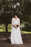 Like many people; I ordered this dress as my wedding dress. I loved it! I did get it altered. I ordered an XL because I was afraid the large would be too small. The XL was a little too long and the sleeves were losse but once altered it was perfect!! It arrived in less than a week! - Elizabeth G.