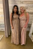 I wore this dress for my brother's wedding this past weekend. I received so many compliments on how everyone loved mine out of all the other bridesmaid dresses. There may be glitter and sequins coming from the dress when you sit but it didn't even matter. I did have to get the sides taken in on the top and the dress cut shorter! - Kaitlyn F.