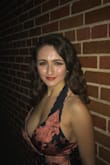 This dress is just beautiful. The colors and design are captivating, and I got so many compliment. I felt like a supermodel! - Haley G.
