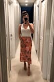Love this, think it's cute with a matching skirt or different top or bottoms to mix or match. Highly recommend for vacays! - Sarah L.