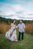 Got this dress for my engagement pictures!! I got this dress in a size M at first, but being large chested, I had to go up a size. So got an L and the chest area was still not what I hoped it would have been. If I was on the average size I'm sure this would have been perfect in a size M. I had to cut off the button on the chest area because it wouldn't close properly. I then bought some tape and applied it to where I needed it to go. I wore some 2in heels and this dress was very long on me. So if you're around my height I suggest higher heels so you won't trip over the dress (which I did several times lol). Overall beautiful dress, flowy, and comfortable! - Claudia M.