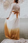 This dress was perfect for our fall elopement backpacking trip! Very flowy in the wind, comfortable enough to hike in and so beautiful for the price! I dip dyed it with Rit Dye Synthetic and it held the color really well. My only tiny complaint is the zipper is hard to manage on your own. - Alyssa C.
