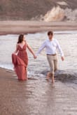It was definitely quite long but that was fine for engagement shots. If I wanted to wear it to an event I would likely get it tailored. We ended up going into the water in our shoot and it easily cleaned up. - Jessica B.