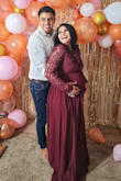I wore this dress for my baby shower.. I Bought a small size it looked perfect.. Though have to do little bit adjustments due to increased bump but otherwise all good.. Highly recommend - Shubhi S.