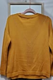 The color of this sweater is such a beautiful golden mustard! I am usually between a small and medium. The medium I bought is a little big, but I don't mind that because I prefer sweaters to fit a bit loose. I also love the pointelle details!
(Please excuse the wrinkles. I didn't fold the sweater before taking the pics) - Laura D.