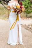 This dress was perfect for our simple and small wedding! It hugs the body in all the right spots. I would absolutely recommend trying it on! - Roxanne W.