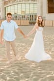 This dress was so comfortable and looks amazing in pictures! I wore it for our engagement photos and couldn't be happier! The side cut outs are so cute, but they do make it difficult to wear a regular bra so I recommend buying a sticky bra. - Danielle L.