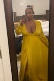 I absolutely LOVE this dress!! It makes me feel elegant and sexy at the same time! Beautiful fabric and the sleeves are amazing! Ordered a large. I'm 5'4, about 180 (just had a baby) and a 36G bust. Didn't wear a bra or fashion tape with dress. - Michaela R.