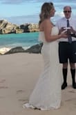 Loved this dress for my vow renewal. The lace is beautiful and lightweight. The fabric has no stretch and is a little see through, but fine with nude undies. Off the rack, it would fit someone with less curves. I had it altered to take in the waist & hips and made the neckline shorter. I am 5'9" and the dress was 2 inches too long in flats. - Allison O.