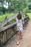 This dress is stunning!! I've never received so many compliments on an article of clothing! I love the wrap to give it a custom fit. Beautiful quality. Highly recommend. - Melissa L.