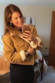 I ordered a size L because I would rather the jacket fit loose than tight. My boyfriend's mother opened the box and tried the jacket on. She fell in awe with it, but she needed a smaller size. I order her two sizes a small and a medium. When the package arrived, I was excited to try the M. The small fit her perfectly and wouldn't you know the Medium fit me too! Haha. When all is said and done I decided to keep the L, just because if I choose to wear chunky knit sweaters or a heavy sweatshirt- the jacket won't be too bulky. Keep that in mind. This trucker jacket is a showstopper! - Emma B.