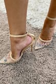 These shoes are even more beautiful in person, the pictures don't do them justice! The rhinestones are very sparkly and catch the light. I ordered my usual size and they fit perfectly, no pinched toes. - Joanna F.