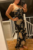 Love the look and feel of this dress. It fits perfectly in the chest which is amazing since my ladies are huge. I'm more like a 36/38E but that wasn't an option on the pull down tab. It was a bit big in the waist and I wish it was a bit tighter but over it's super slimming. I tried the large and the overall fit was better but I couldn't wear a strapless bra without it showing. - Jess S.