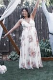 I love this dress! I got it for a last minute wedding dress for my change in wedding venue due to Covid and had a beautiful backyard wedding. I was initially worried because my bust is big and it didn't fit with a bra for me but thankfully it's lined really well and I had no issues throughout the night. - Joy S.