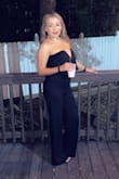 I was skeptical about wearing this just because I've never really worn a jumpsuit/romper. I'm big breast & small waist so it's hard to find one-pieces that fit good. After reading reviews, I took a chance and ordered a small. It fit perfectly! Not too small on my boobs and not loose or big in the waist/hip area. It does run long but that was an easy fix. Wore it to a wedding & I got so many compliments in-person & on Facebook! - Elsi P.