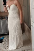 I loved the look and fit of this dress, but during the 2 minutes I tried it on, my underarms got all scratched up. If this was a main event dress, I would have kept it. But I'm looking for comfortable, after party dress after I've been in my wedding dress all day, so it needs to be comfortable. - Kelly C.