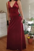 Nice quality, lovely color, flattering fit, a great dress. It is certainly floor length. I'm about 5'4", but wearing 4" heels under there. If you're a bit shorter, you might need to do a bit of hemming or invest in platform shoes. Whatever fits your vibe. The dress is unpadded (having no chest, that's no issue for me), but I think you could easily find a bra that fits the cut of the dress. While it's a low neckline, it's not super plunging either. I wish I could give you my waist/hip measurements but I honestly don't know them. Just know this dress is hiding my thunder thighs while giving me some shape. But, I don't think this dress hides tummy pudge very well. Granted, my significant other says it's not noticeable, so maybe yours will say the same. - Elsa K.