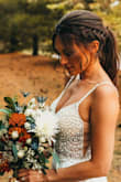Alterations needed for length only. I'm 5'0" so that was expected. Great fit otherwise. I wore this on my wedding day and no one believed that it was from Lulus! I got a lot of compliments. Love this dress <3 - Nina H.