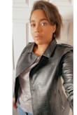 This jacket needs an extra-large option. It is really tight around the arms and shoulders. Slightly disappointed, and wish it wasn't so tight. - Natalie J.