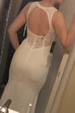 It's soo pretty and I almost chose it, but it's a bit too stretchy and I would have had to have it taken in to be nice and fitted. Also, I wasn't keen on the keyhole back; I prefer just a low back. But if you like it and the mermaid style with a mix of lace and minimalism, this dress is perfect for you! - Jessica P.