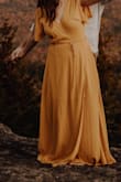 Definitely could've used to have it hemmed since I was barefoot for my photos, but it worked out perfectly! - Anna G.