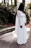 I bought this for my intimate garden elopement ceremony. We got married in the fall, but we live in the south so I knew I wanted something breathable. It ended up being 80 degrees that day and surprisingly I wasn't burning up! My husband loved it! I had to get the sleeves tailored and the bottom hemmed, even with a 3" heel. It wasn't tight around the waist and it was just fine in the chest area! - Tia S.