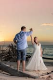 Wore this dress for my wedding. Minor alterations for length and sleeves and it was perfect! Definitely runs small. I ordered a large and it fit like a glove. - Megan K.