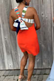 Loved this dress so much! It is form fitting without being too tight or "body-con". The color is a bright orange-red, perfect for the summer wedding I wore it to. I received so many compliments on the dress. My rib cage is a little big so I teeter between a small and medium, but the small worked great. I wore pasties instead of a bra since the back was open. - Claudia H.