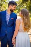 This is a truly gorgeous gown, the beadwork is stunning and really makes this dress feel special. Originally we had a destination wedding planned, but due to COVID we had to cancel and instead did a Zoom wedding at the courthouse, and this dress looked beautiful in pictures and on video!!
The skirt is very heavy, so if you live somewhere hot & humid, your legs will absolutely be hot as an oven but it was worth it to me! The back of this dress is gorgeous too, though it was a little loose/baggy.
I purchased a size 6 & it fit my 29" waist perfectly. It's free through the hip so it was actually really comfortable. It is super long-- I am 5'7 and was wearing 3.5 inch heels and the skirt still was dragging on the ground just slightly. If you get it altered though, that's an easy fix. For the price, I HIGHLY recommend this dress! - Johanna K.