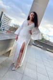 I bought a couple lower priced options from this site for my courthouse ceremony and though they were all pretty, this was a show stopper! I felt like a real bride, just so beautiful and glamorous is this dress. I'm very likely going to save it for the big show, I just love it too much to have only worn it that one time! - Derica D.