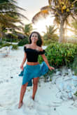 This skirt can be dressed up or down. I chose to wear it for a fancy dinner.  The material is so soft and comfortable.  The cut in the skirt gives it the perfect amount of sexiness. - Sabrina M.