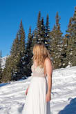 I ended up using this dress as my elopement dress although it didn't fit the best. I got a size 6 and the length was perfect with some high heels, but the top mesh section was both too tight and too big. Just to nitpick for others, the bra cups were a little too big, but I didn't worry about changing them because there was just a little extra space near the top and it still looked fine. I have a bit wider shoulders and that made it so the clasp on the back didn't close which was an easy fix at the tailors. I did feel as though the beads were not sewn on very well, but again the tailor was able to fix it easily. Overall, this dress was beautiful and was exactly what I had wanted for my small wedding. - Erika S.