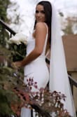 This dress was better than any dress I tried on at a bridal salon and boy did I save a fortune!!!! It was plain and classy with just enough sass, felt like a dress that was made for me and my personality! This dress made my husband cry. It was perfect. - Isabel W.