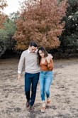 I wore this for my causal engagement shoot just as pictured!! Its form fitting and the perfect amount of bust! The orange is definitely more on the burnt UT Austin side than a sunny orange! Perfect fall color! - Kathy H.