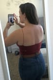 Love the material of these, got it in three colors! Material is nice and stretchy, definitely form fitting to the body. I could probably do a small, but I guarantee it would probably roll up on my stomach if I did. I wouldn't say it's supportive (especially for my size) and my boobs definitely don't fit in the allotted cup area that the material creates, but it's still cute enough to wear by itself. I give this top 4 stars because of the way the straps lay on me. I guess I may just have broad shoulders, but the straps almost don't want to stay on my shoulders. It seems like the back stretches out more than the front? Maybe that's why the straps fall off so easily? Not sure, but nothing a bit of altering can't fix. Besides that, I love it. This top will be perfect for hot summer days here in Texas. - Megan W.