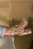 These shoes are gorgeous, but I agree with an earlier review saying it is tight around the ankles. If you have muscular calves like me, just be aware that it may be tight at the top. I just unzipped the zipper slightly at the top and that pretty much fixed the issue for me, so it was worth it to keep these! - Allison H.