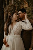 A very inexpensive but quality dress + a little imagination = Perfect wedding dress! just switched out the white underlay to a skin color fabric found at JoAnne's and added an $80 overskirt from the Brides Project. A few slight alterations and you have a beautiful one of a kind wedding dress under $300. - Ellita P.