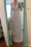 I got this dress for my last minute wedding! It came very fast! I read lots of reviews and ordered a small from the other girls I saw who wrote reviews. It was a tad too big. I'm pretty tall and it was too long on me which is surprising & the chest area was too big but other than that, I got it hemmed & sewed a bit to fit tighter & it looks absolutely amazing! & the quality of the dress is very well made! Definitely recommend! - Rhiannan B.