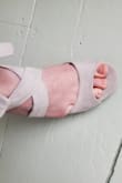 I ordered the grey for my platinum over pewter & blush wedding dress. The color looks fantastic against my veil in the sunlight (photo included). They are a very pretty warm shade of grey. My fiancé actually remarked on them being a perfect color for wedding shoes. They have a nice suede sheen to them that makes them go with any color they are next to. I usually fluctuate between a 7.5/7.5-wide for heels. I wish they had wide sizes for these because the foot length is perfect with the 7.5, but my toes have some overflow. I love these so much, I'm going to exchange them for 8's. Costumer service for the exchange was super easy and free. The ties are very comfortable against the malleolus bone and achilles. The ribbon is passed from the side of the foot through a loop at the back to keep it in place. The sole is nicely padded with a little extra padding at the ball of the foot. Only potential blister zone appears to be the arch over the toes if the size is tight. - Sarah L.