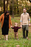 This dress looked great in our family portraits. I ordered according to the size chart but definitely could have sized down. It fit well enough for me to just wear it with a cardigan though. It was an awesome choice! The material is heavy and it's very comfortable and versatile. - Kayla S.