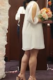 My husband and I did a small wedding at the local courthouse while we work on planning our big ceremony. This dress was absolutely perfect. Casual yet elegant and classy. Perfect length as well! - Yaya J.