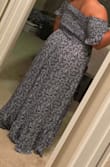This dress looked really cute on and I kept it for sure but it was definitely a little too long in the back for me (could just be because I'm short, 5'3) and the top is that crinkled stretch elastic so unfortunately it's hard to tell what size would be best until you can try it on and see how stretchy it actually is. Being pretty busty, I went for the XL as I normally do but I could have definitely gone with the L and it would have been a better fit up top as well as a bit shorter in the back. - Tatiana C.