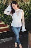 The lace gives this top a vintage look, but the pleated sleeves adds a modern unique style. Wore this with dark wash jeans and high heels worked so well. It was a little loose around the under arm area. but I wouldn't have gone smaller. Recommend to wash on delicate and in a garment bag. - Erin N.