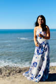 I love how it fit me, don't worry about the backless, it's not too low, so nothing to worry. It's a beautiful beach dress. - Varsha V.