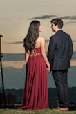I love this dress, the back is so cute! I wore it for my engagement pictures and it was a total success. It does come a little long, so it might to be hemmed depending on the person's height. - Valentina L.